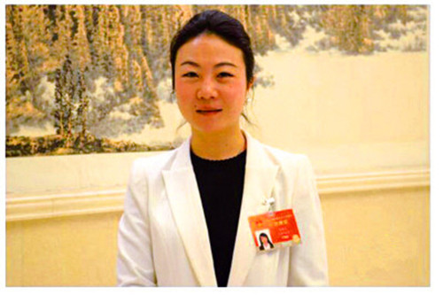 带来六个提案，重点还是“农民工”问题 ——来自开云kaiyun网页版官网_开云kaiyun（中国）智能的全国人大代表张晓庆接受本报记者专访，为进城务